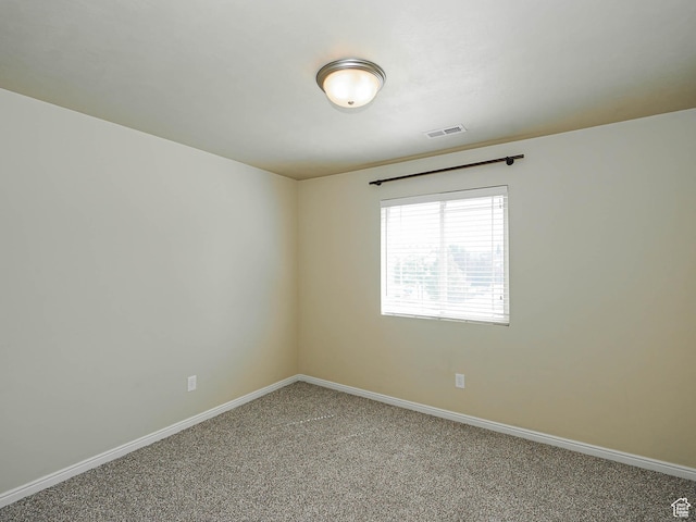 6900 S Village Haven Ln W, Midvale, UT 84047 - spare room featuring light colored carpet and baseboards