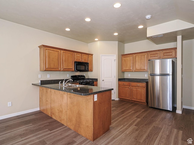6900 S Village Haven Ln W, Midvale, UT 84047 - kitchen featuring black appliances, dark wood-type flooring, a peninsula, brown cabinetry, and recessed lighting