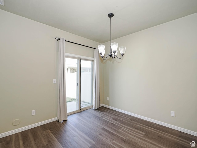 6900 S Village Haven Ln W, Midvale, UT 84047 - empty room with a chandelier and dark wood-type flooring