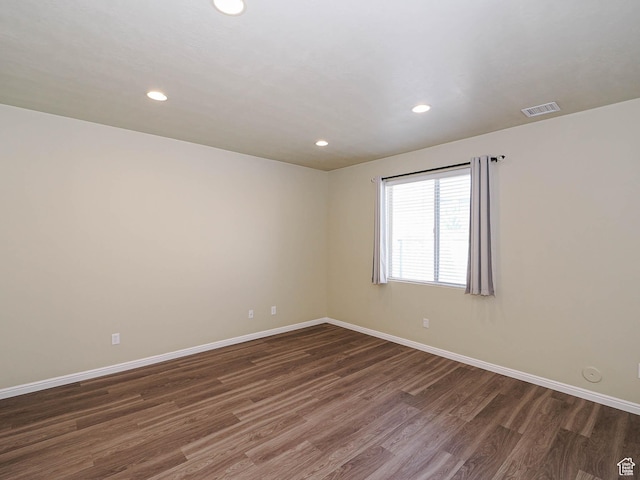 6900 S Village Haven Ln W, Midvale, UT 84047 - unfurnished room with wood finished floors and recessed lighting