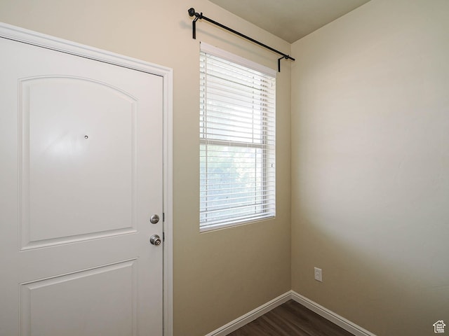 6900 S Village Haven Ln W, Midvale, UT 84047 - entryway featuring baseboards and dark wood finished floors