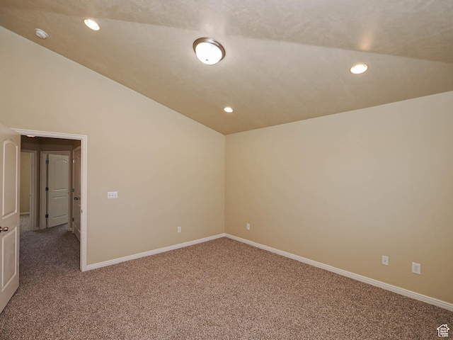 6900 S Village Haven Ln W, Midvale, UT 84047 - empty room featuring vaulted ceiling, carpet flooring, recessed lighting, and a smoke detector