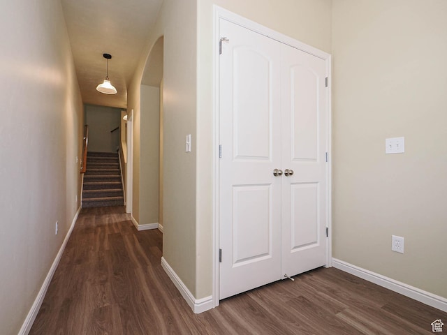 6900 S Village Haven Ln W, Midvale, UT 84047 - corridor with dark wood-style flooring, arched walkways, and stairway
