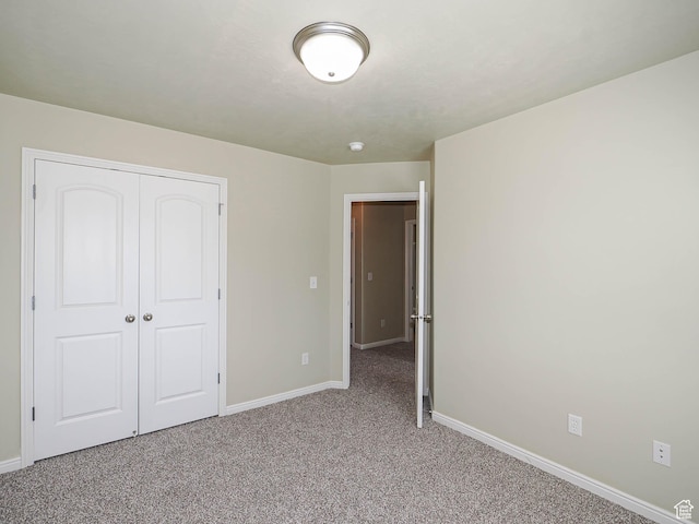 6900 S Village Haven Ln W, Midvale, UT 84047 - unfurnished bedroom with light carpet and a closet