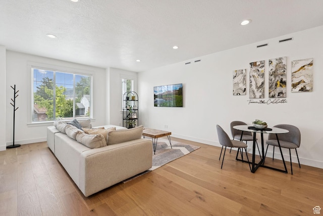 520 S Orchard Dr Unit 1, Bountiful, UT 84010 - living area featuring light wood-type flooring and recessed lighting