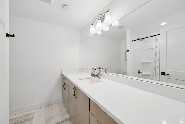 520 S Orchard Dr Unit 1, Bountiful, UT 84010 - bathroom with vanity, marble look tile flooring, and a shower