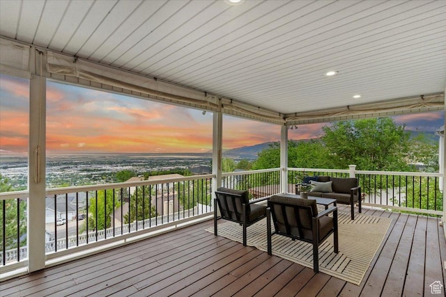53 N Foxhill Rd N, North Salt Lake, UT 84054 - deck at dusk featuring outdoor lounge area