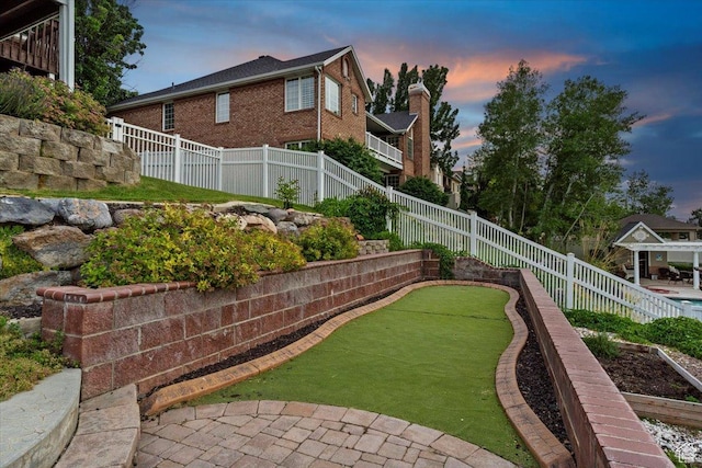 53 N Foxhill Rd N, North Salt Lake, UT 84054 - fenced backyard with a putting green