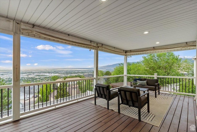 53 N Foxhill Rd N, North Salt Lake, UT 84054 - wooden terrace featuring an outdoor living space and a mountain view