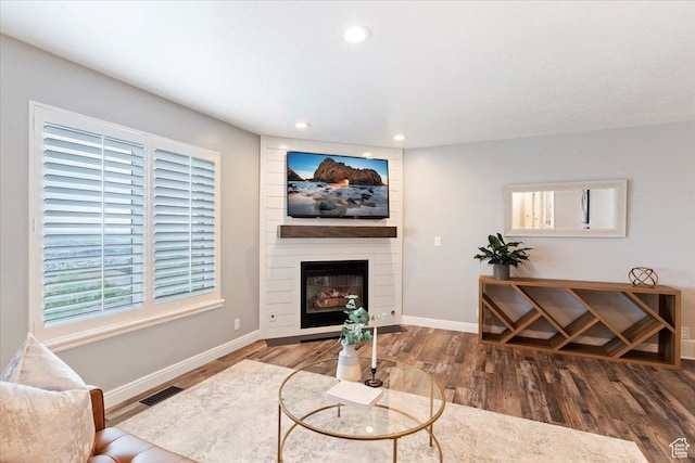 53 N Foxhill Rd N, North Salt Lake, UT 84054 - living area featuring wood finished floors, a fireplace, and recessed lighting