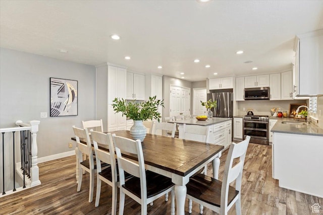 53 N Foxhill Rd N, North Salt Lake, UT 84054 - dining space featuring light wood finished floors and recessed lighting