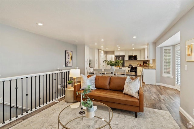 53 N Foxhill Rd N, North Salt Lake, UT 84054 - living room with light wood-style flooring and recessed lighting