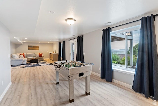 53 N Foxhill Rd N, North Salt Lake, UT 84054 - rec room with light wood-style flooring, healthy amount of natural light, and recessed lighting