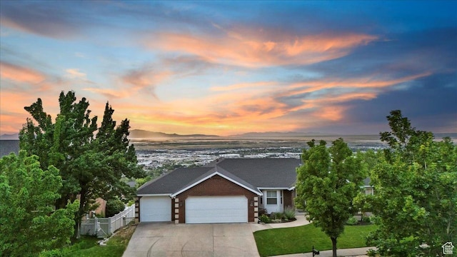 53 N Foxhill Rd N, North Salt Lake, UT 84054 - view of front of house featuring a garage and concrete driveway