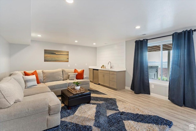 53 N Foxhill Rd N, North Salt Lake, UT 84054 - living area featuring bar with sink, light wood-type flooring, and recessed lighting