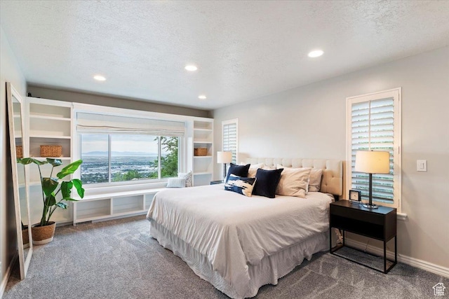 53 N Foxhill Rd N, North Salt Lake, UT 84054 - bedroom with carpet floors, a textured ceiling, and recessed lighting