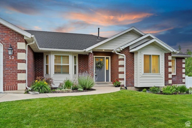 53 N Foxhill Rd N, North Salt Lake, UT 84054 - view of front of property with brick siding, a front lawn, and a shingled roof