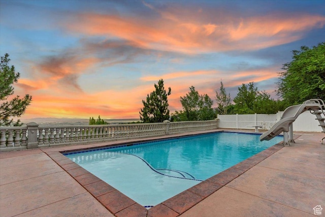 53 N Foxhill Rd N, North Salt Lake, UT 84054 - view of pool with a water slide and a patio