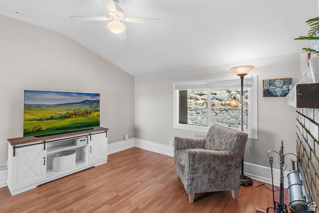 79 S 300 E, Farmington, UT 84025 - living area featuring lofted ceiling, light wood finished floors, and ceiling fan