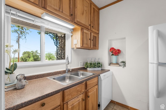 79 S 300 E, Farmington, UT 84025 - kitchen with white appliances, plenty of natural light, light tile patterned flooring, and dark countertops