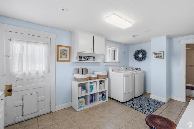 79 S 300 E, Farmington, UT 84025 - laundry room featuring separate washer and dryer, light tile patterned flooring, and cabinet space