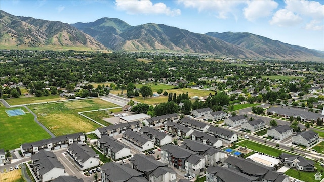 427 W 65 S, Providence, UT 84332 - aerial view of property and surrounding area with a mountainous background and nearby suburban area