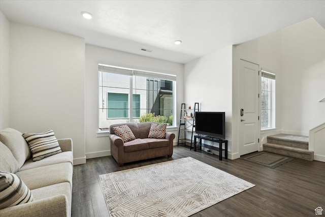 427 W 65 S, Providence, UT 84332 - living area featuring healthy amount of natural light, wood finished floors, stairs, and recessed lighting
