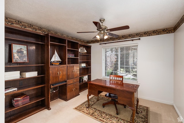 561 S Woodland Dr E, Farmington, UT 84025 - home office featuring light colored carpet, ceiling fan, and a textured ceiling