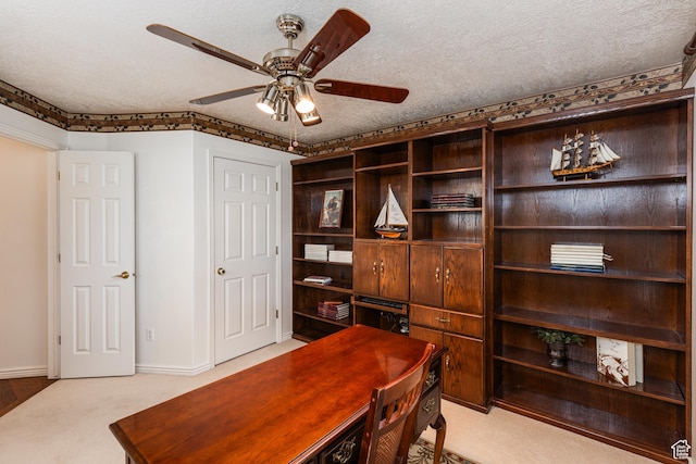 561 S Woodland Dr E, Farmington, UT 84025 - office featuring a ceiling fan, carpet floors, and a textured ceiling