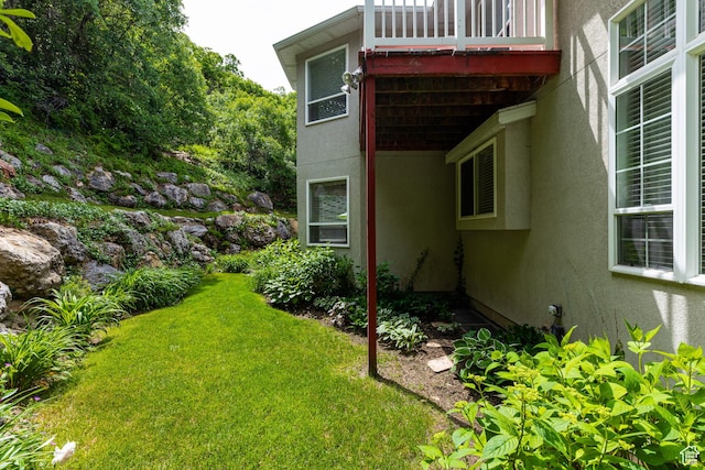 561 S Woodland Dr E, Farmington, UT 84025 - view of grassy yard featuring a balcony