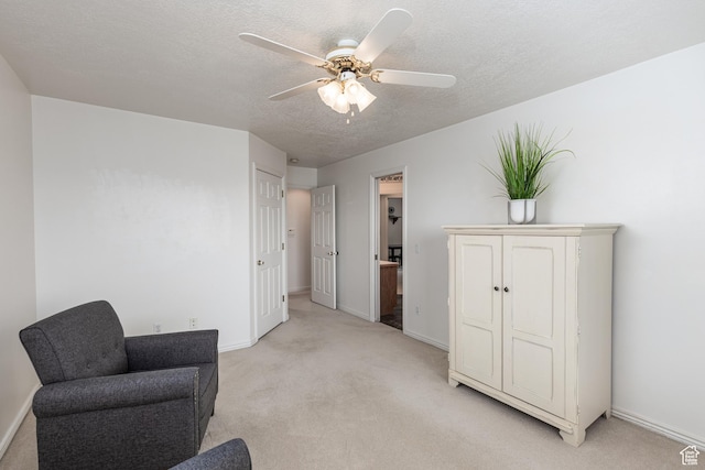 561 S Woodland Dr E, Farmington, UT 84025 - sitting room featuring light carpet, a ceiling fan, and a textured ceiling