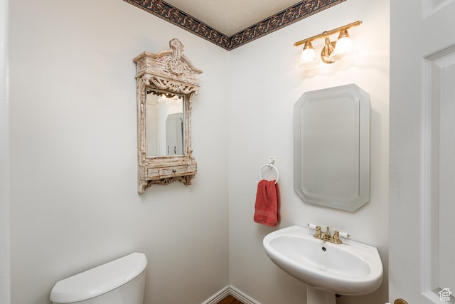 561 S Woodland Dr E, Farmington, UT 84025 - bathroom featuring toilet and a sink