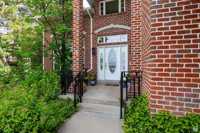 561 S Woodland Dr E, Farmington, UT 84025 - doorway to property with brick siding