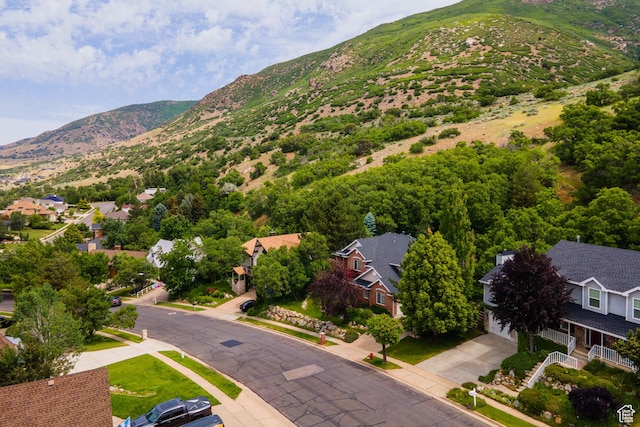 561 S Woodland Dr E, Farmington, UT 84025 - aerial perspective of suburban area with a mountainous background