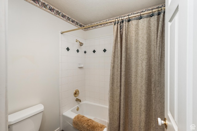 561 S Woodland Dr E, Farmington, UT 84025 - bathroom with shower / bathtub combination with curtain and a textured ceiling