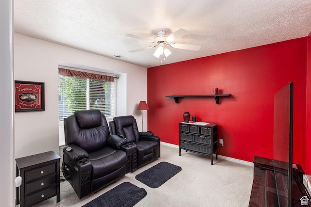 561 S Woodland Dr E, Farmington, UT 84025 - living area featuring a ceiling fan, carpet, and a textured ceiling