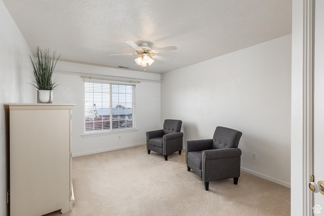 561 S Woodland Dr E, Farmington, UT 84025 - sitting room with light carpet, a ceiling fan, and a textured ceiling