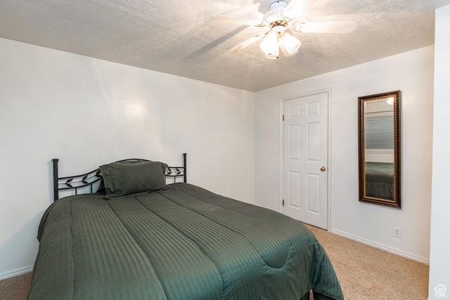 561 S Woodland Dr E, Farmington, UT 84025 - bedroom with carpet, a textured ceiling, and ceiling fan