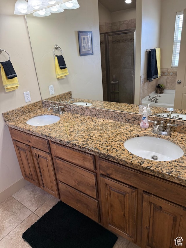 4257 W Lake Bridge Dr S, South Jordan, UT 84009 - bathroom featuring a shower stall, double vanity, a bath, and tile patterned flooring