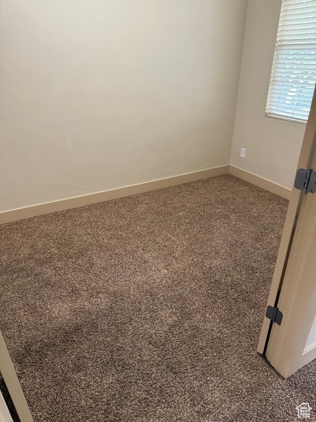 4257 W Lake Bridge Dr S, South Jordan, UT 84009 - empty room with baseboards and carpet flooring