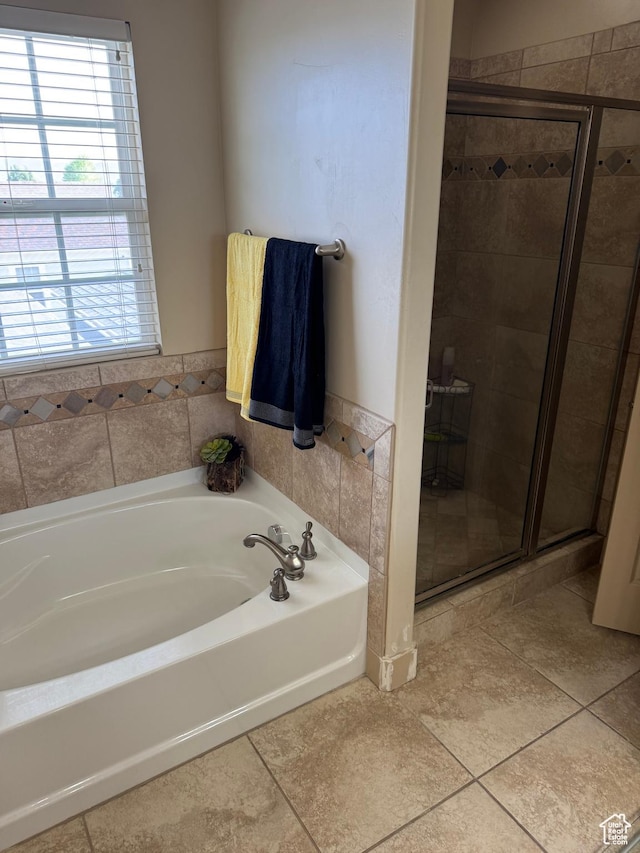4257 W Lake Bridge Dr S, South Jordan, UT 84009 - bathroom with a bath, a stall shower, and tile patterned floors