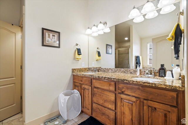 4257 W Lake Bridge Dr S, South Jordan, UT 84009 - full bath with a stall shower, double vanity, and tile patterned floors