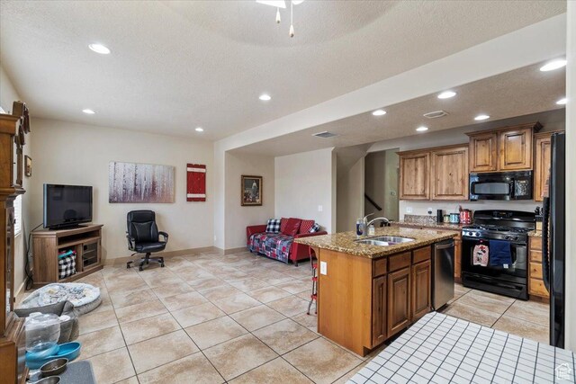 4257 W Lake Bridge Dr S, South Jordan, UT 84009 - kitchen featuring black appliances, open floor plan, recessed lighting, light stone countertops, and light tile patterned flooring