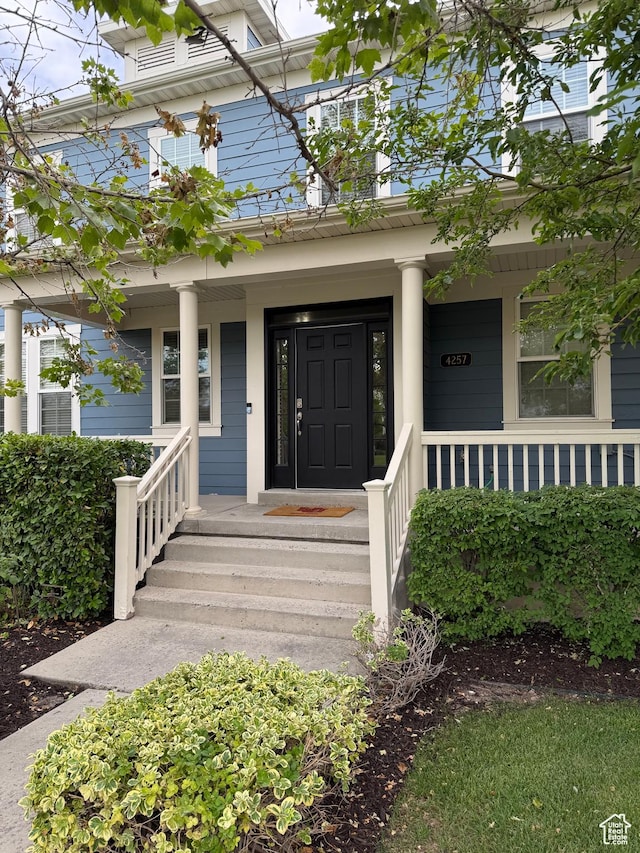 4257 W Lake Bridge Dr S, South Jordan, UT 84009 - doorway to property featuring covered porch