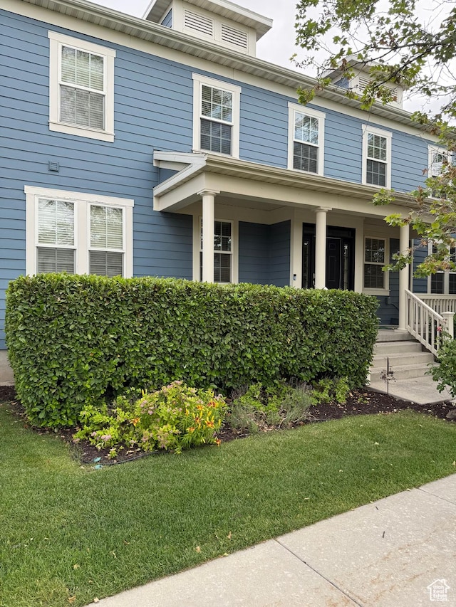 4257 W Lake Bridge Dr S, South Jordan, UT 84009 - traditional style home with a porch and a front lawn