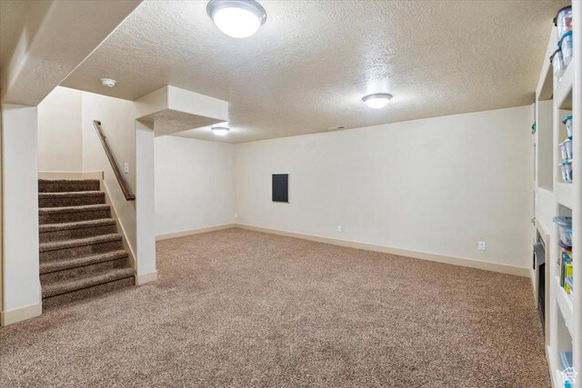 4257 W Lake Bridge Dr S, South Jordan, UT 84009 - finished basement with carpet flooring, a textured ceiling, and stairway
