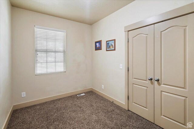 4257 W Lake Bridge Dr S, South Jordan, UT 84009 - unfurnished bedroom with carpet floors and a closet