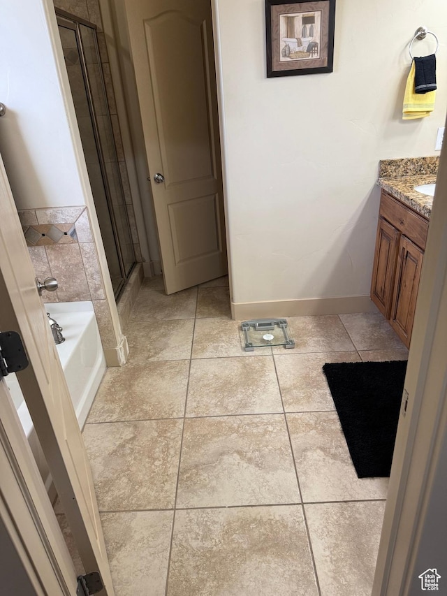 4257 W Lake Bridge Dr S, South Jordan, UT 84009 - full bathroom with a shower stall, a bath, vanity, and tile patterned flooring