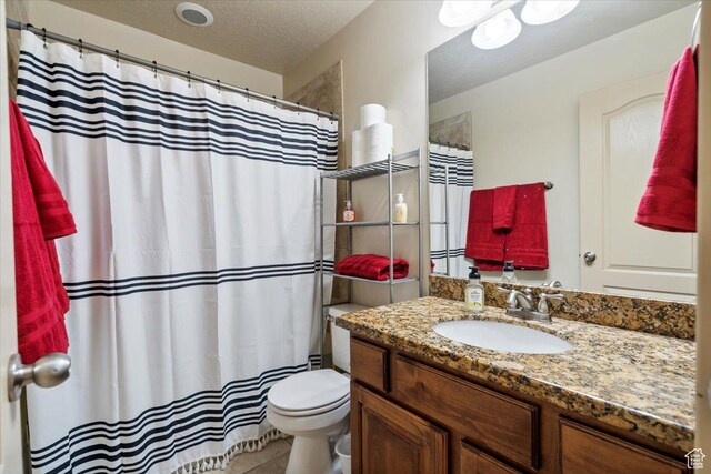 4257 W Lake Bridge Dr S, South Jordan, UT 84009 - full bath with vanity, a textured ceiling, a shower with curtain, and tile patterned flooring