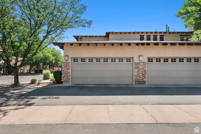 1692 E Kelmscott Ct S Unit C, Salt Lake City, UT 84124 - view of front of house with stucco siding and stone siding